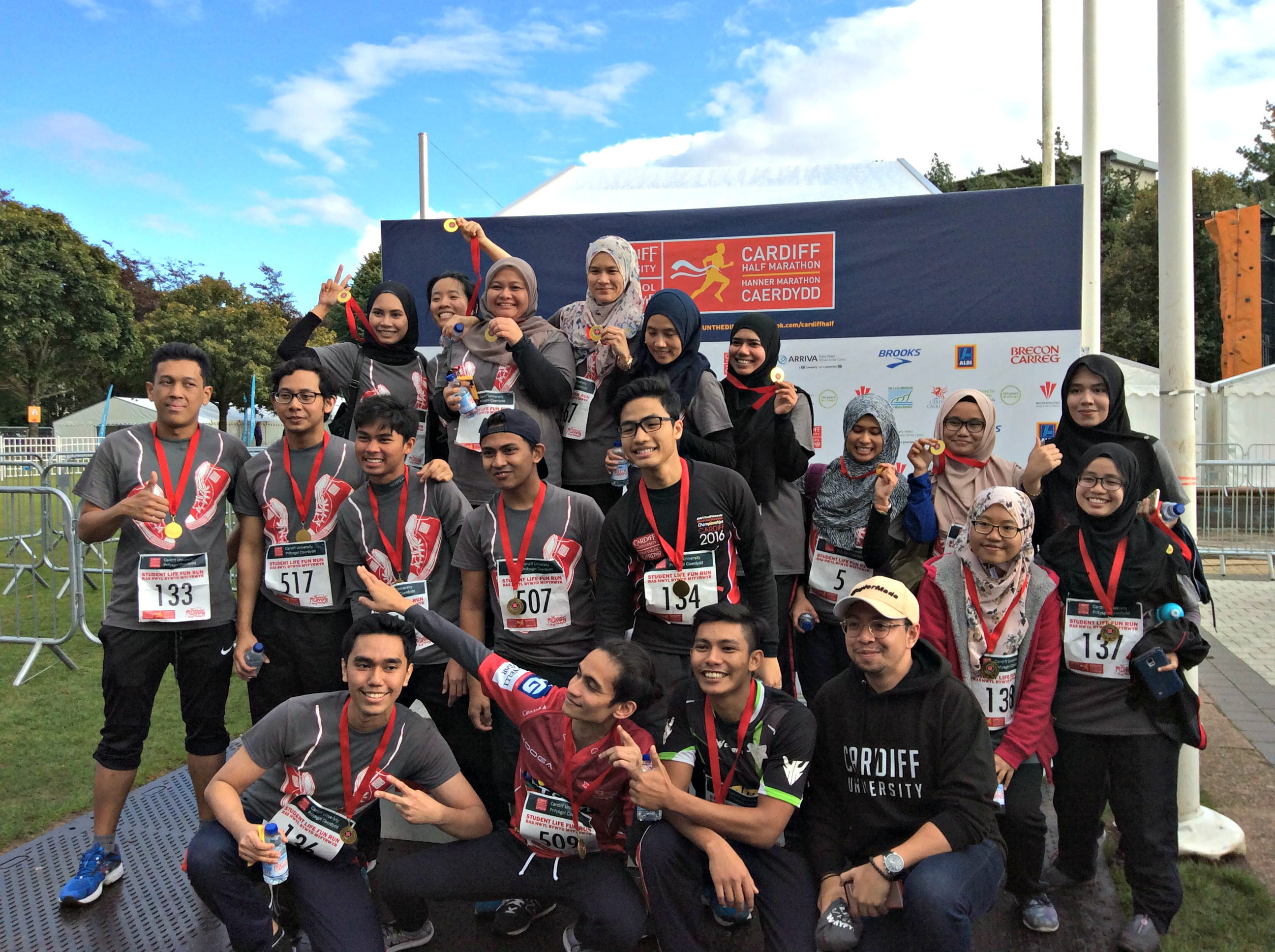 International students with their medals