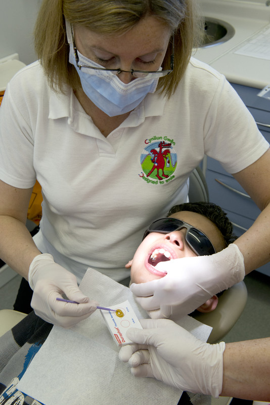 Child receiving dental treatment