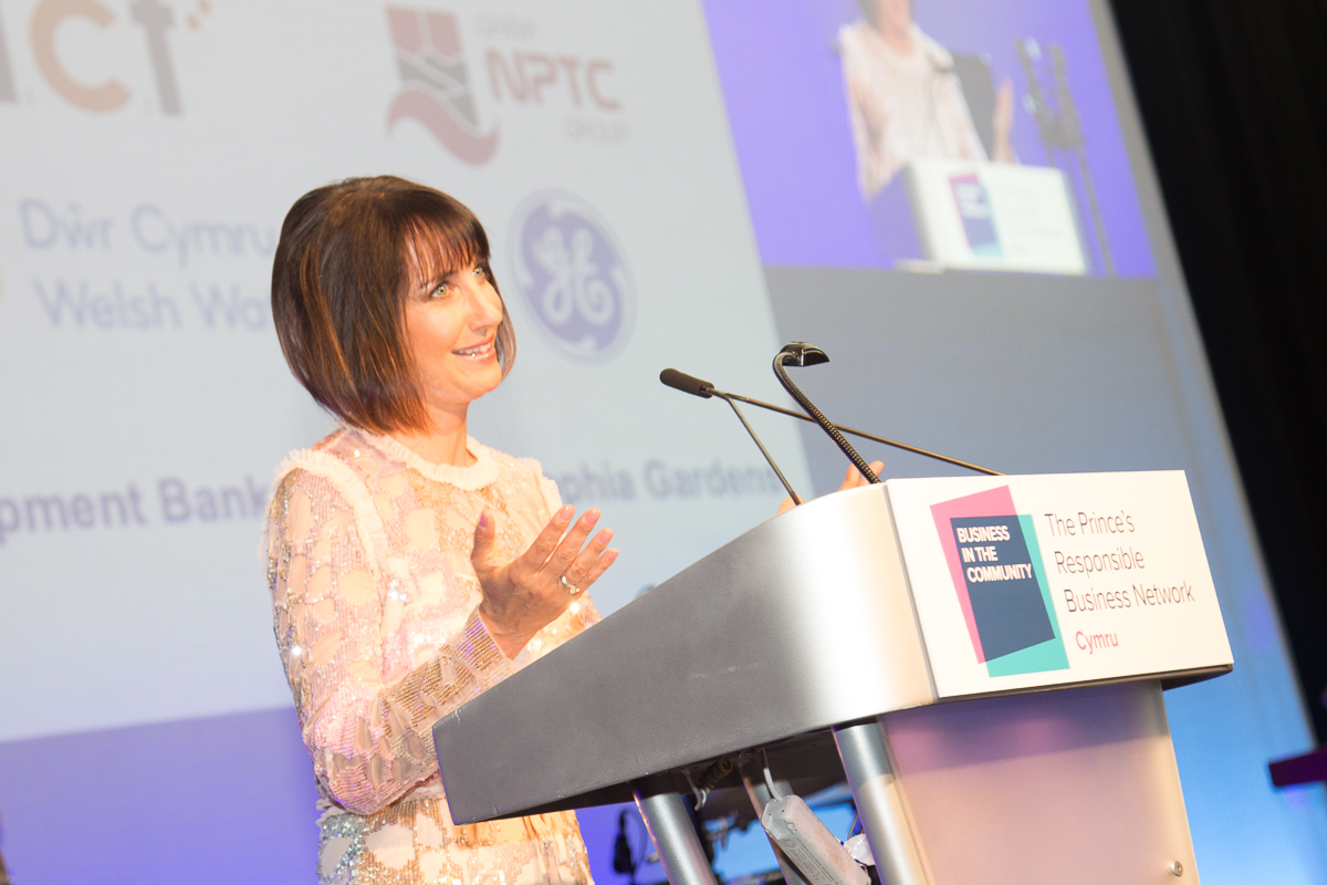 Woman presenting at podium