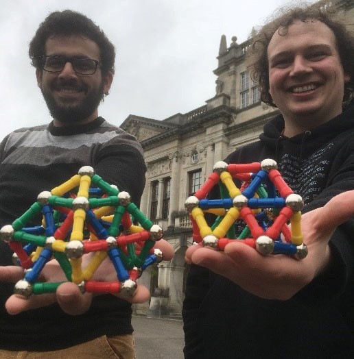 Current student Omar Al Badi & Dr Adam Nevin, a researcher in Dr Easun&rsquo;s group, demonstrating topological framework models using magnetic balls and sticks.