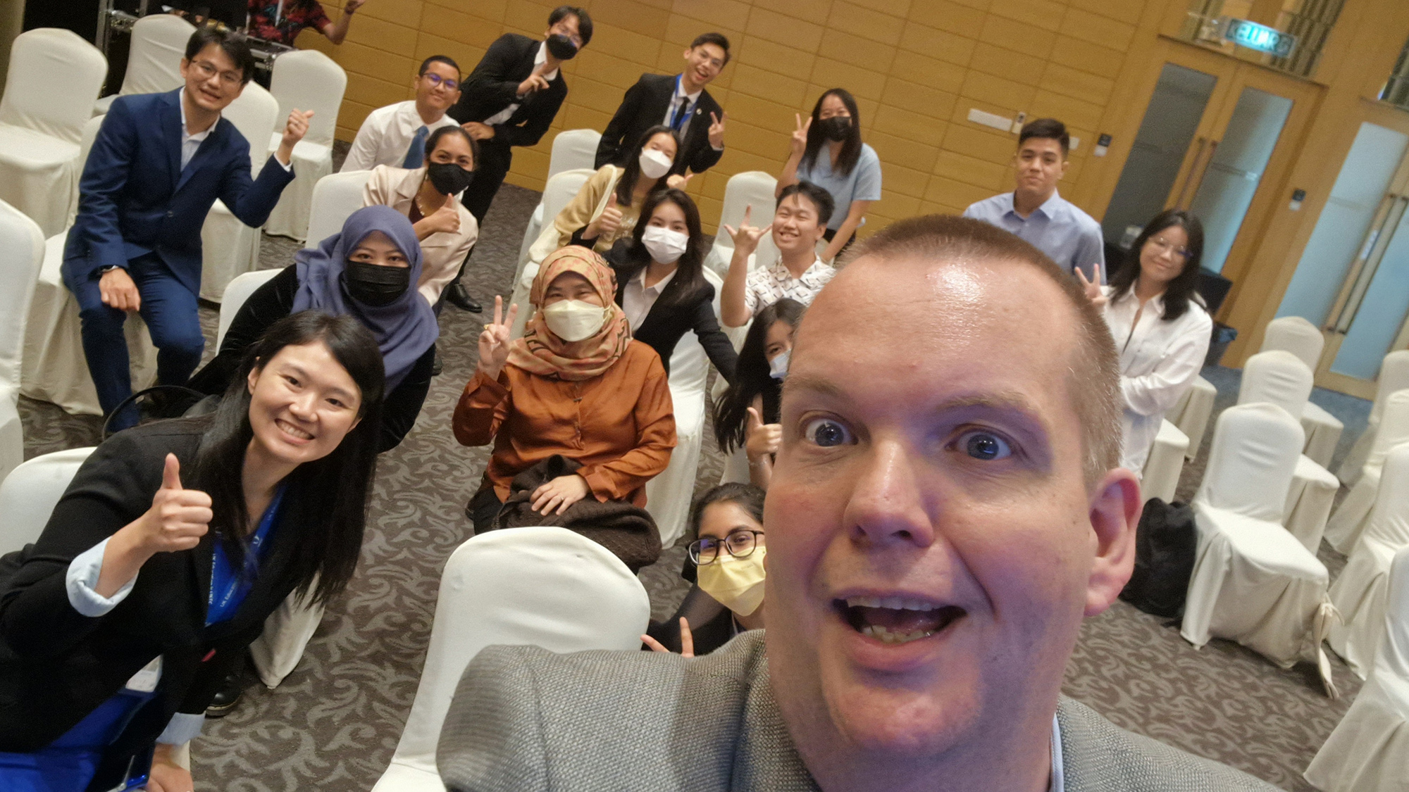 Professor Barr with attendees following his lecture