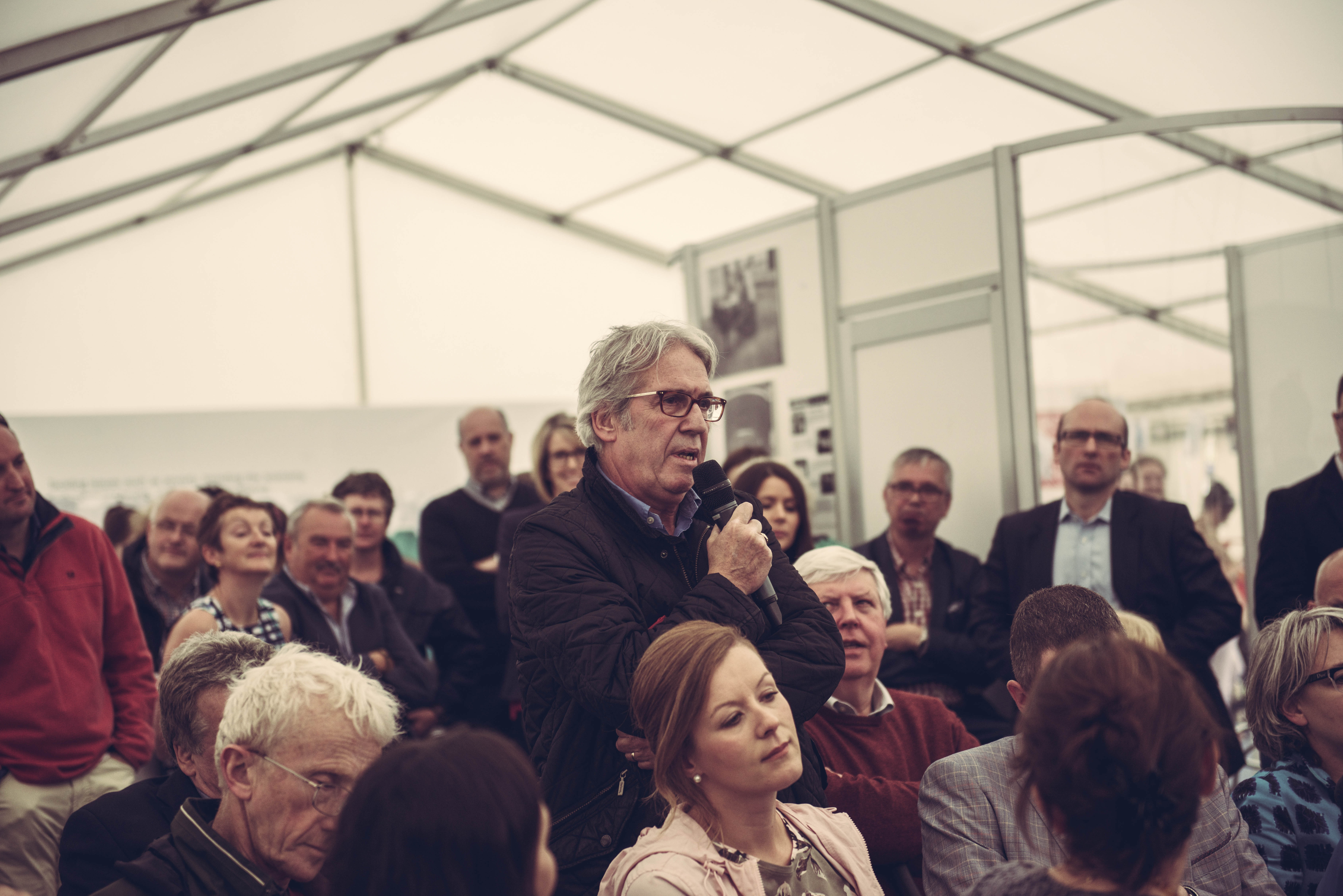 Crowd member asks question at 2015 Eisteddfod