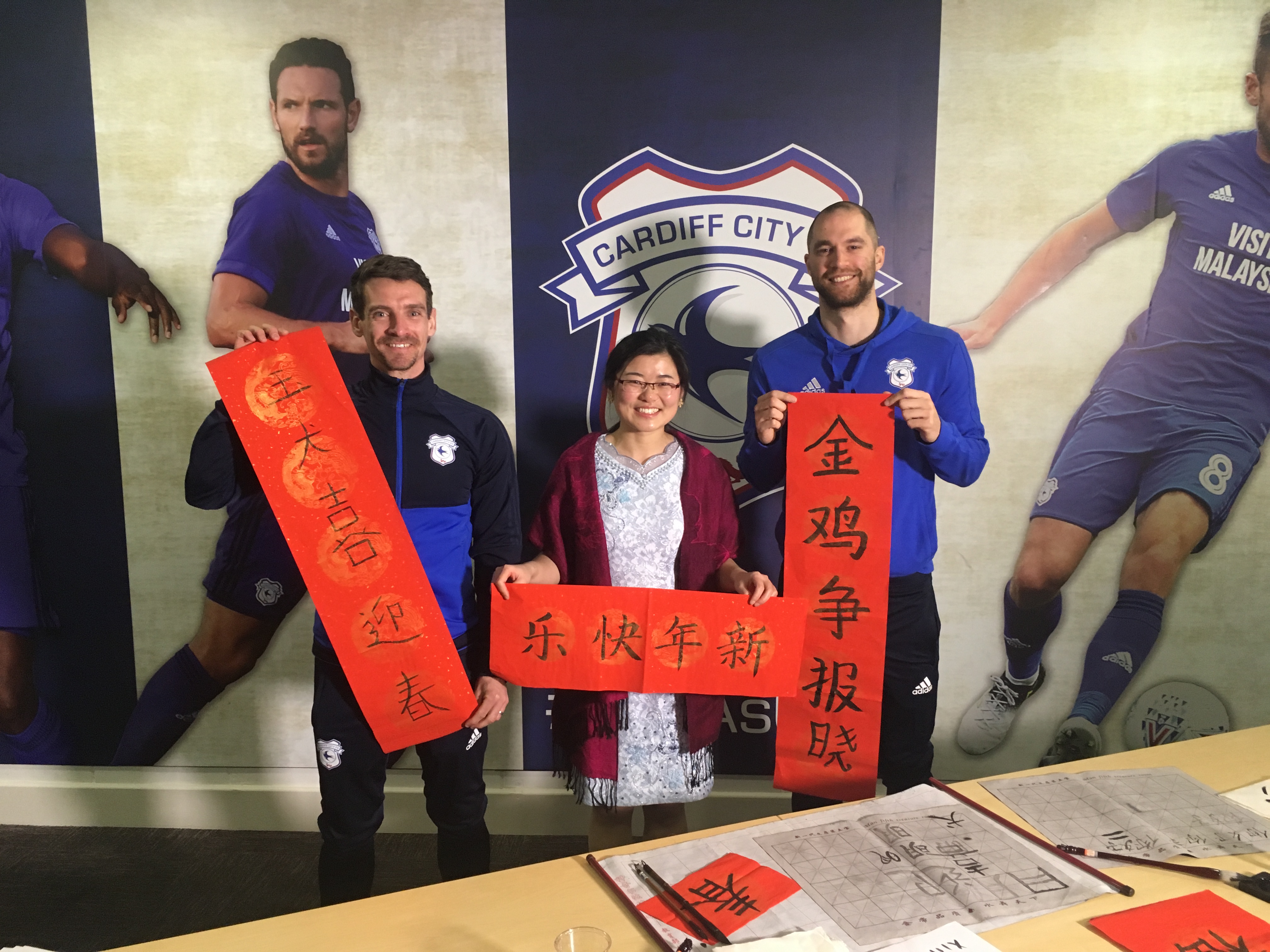 Cardiff Confucius Institute tutor with Cardiff City FC Players 