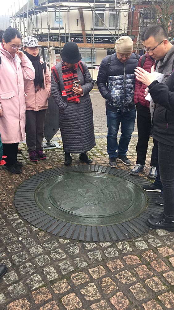Delegates viewing memorial plaque dedicated to Aneurin Bevan
