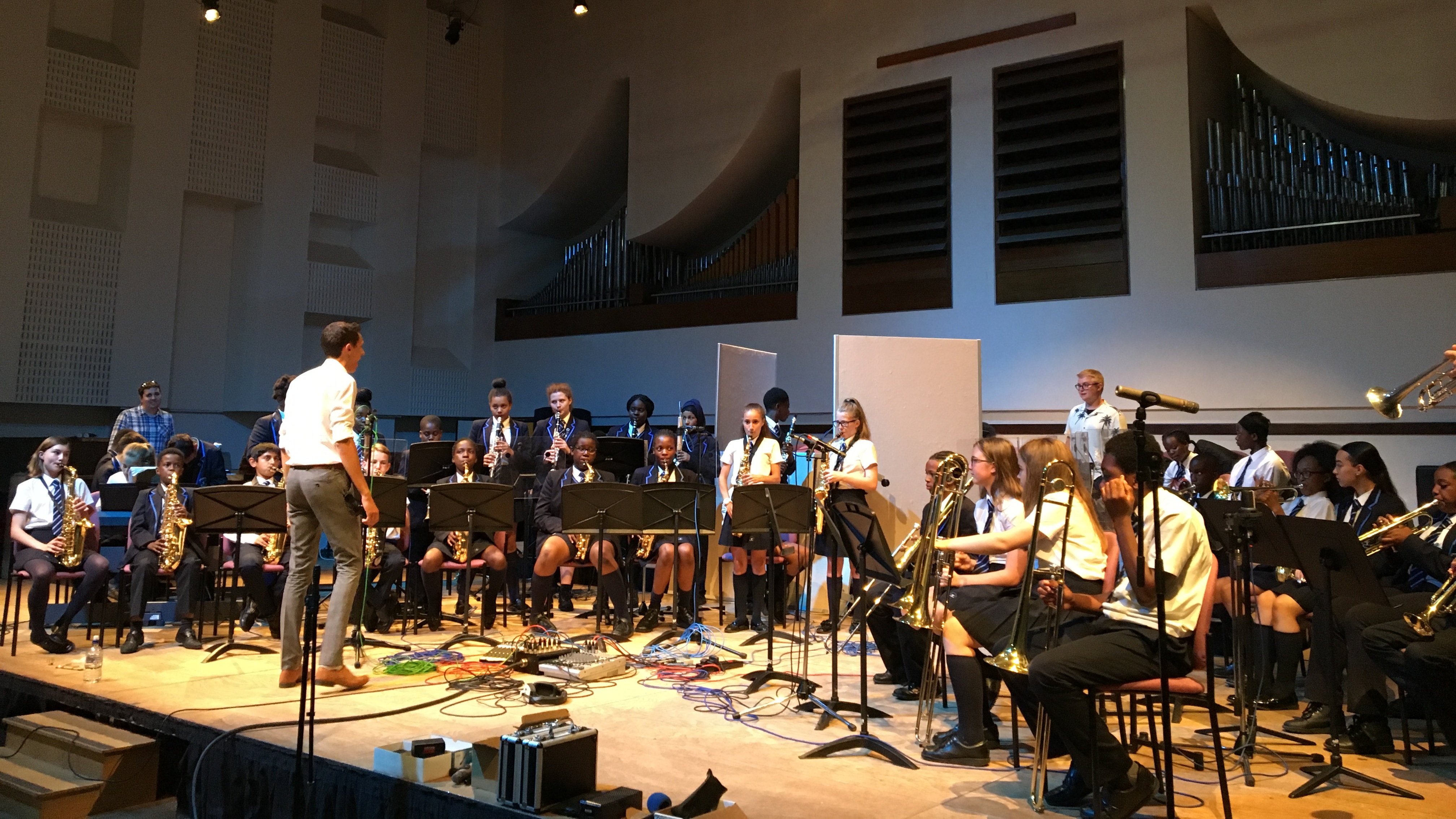 Students from Goresbrook School performing music with student Matt Lush at Cardiff University School of Music