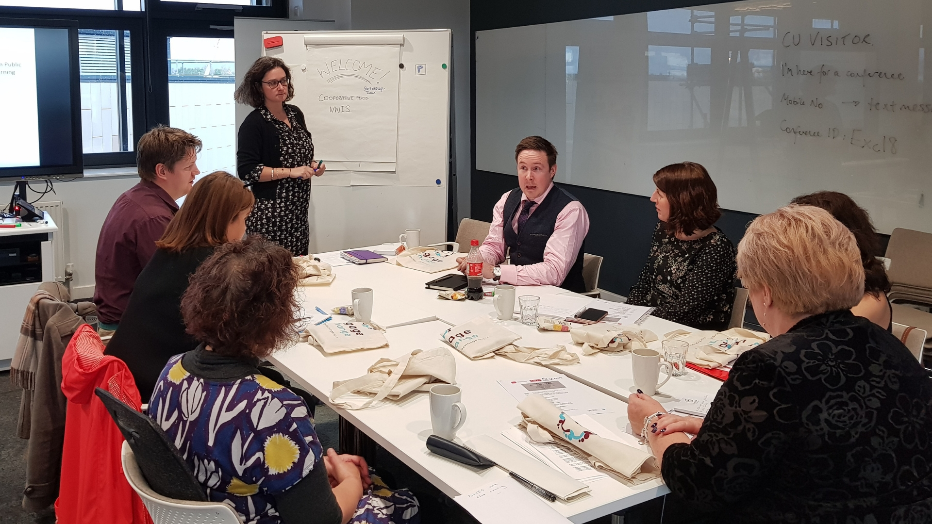 Woman leads small group work