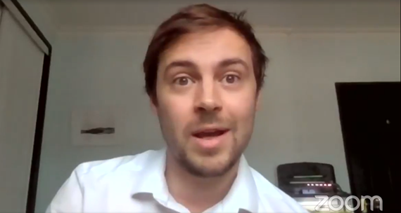 Man delivering presentation via Zoom