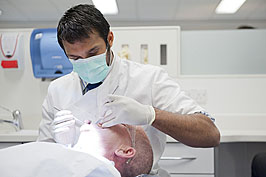 Dentist treating a patient