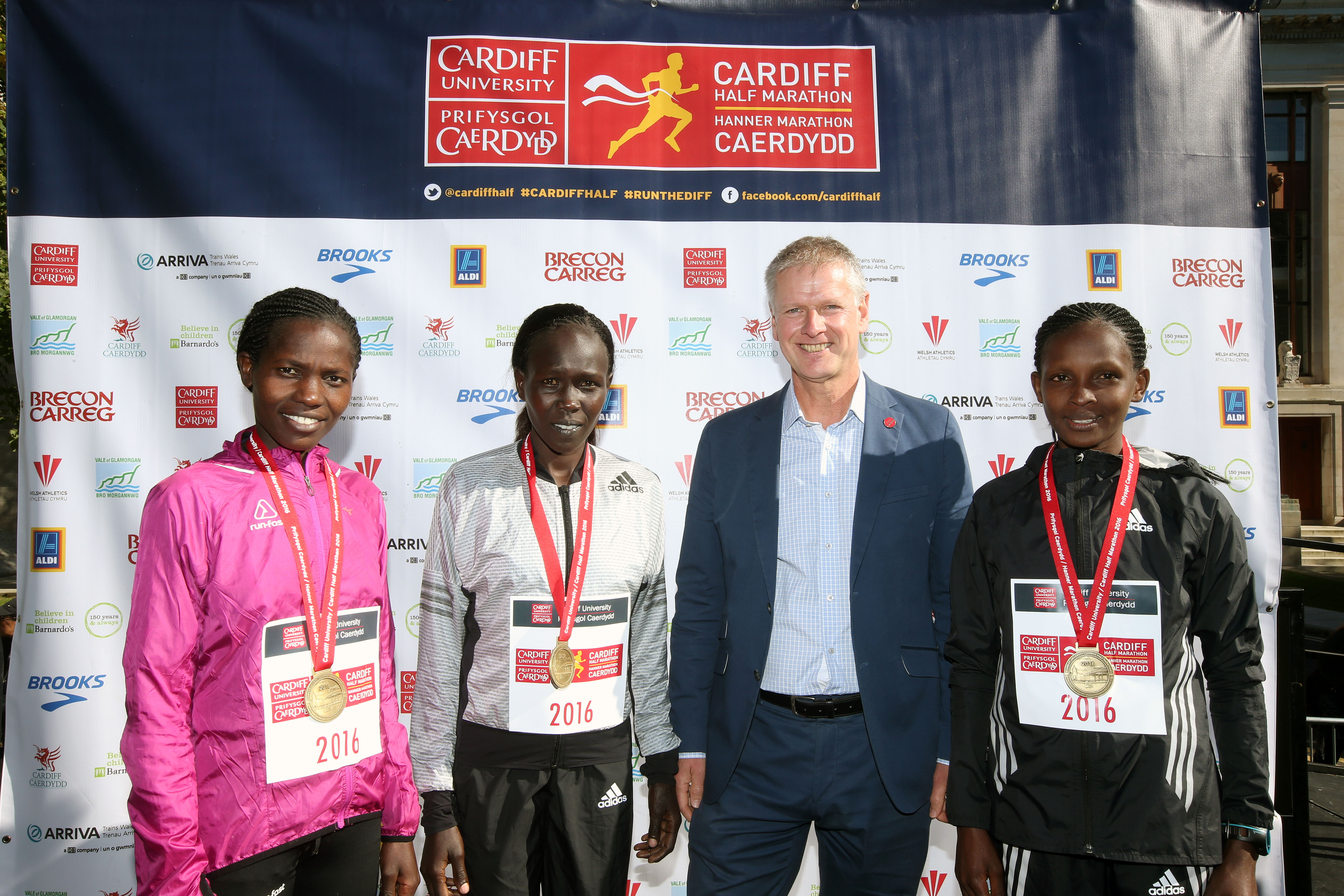 VC with top three marathon runners