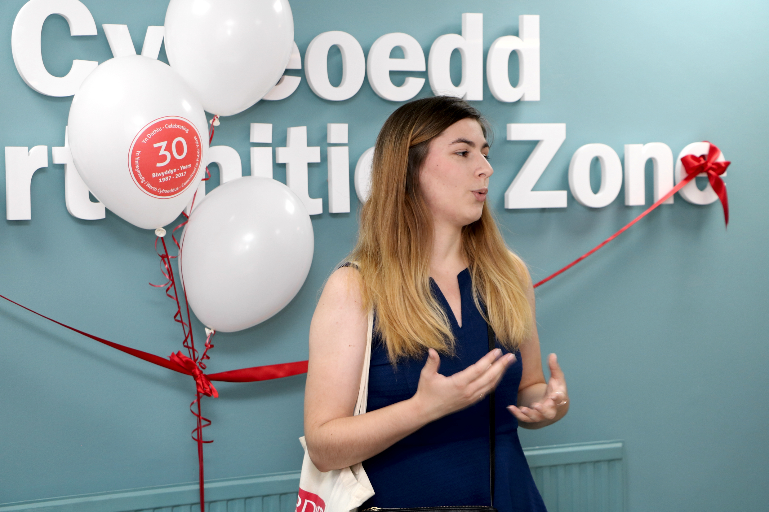 Young woman speaking to audience