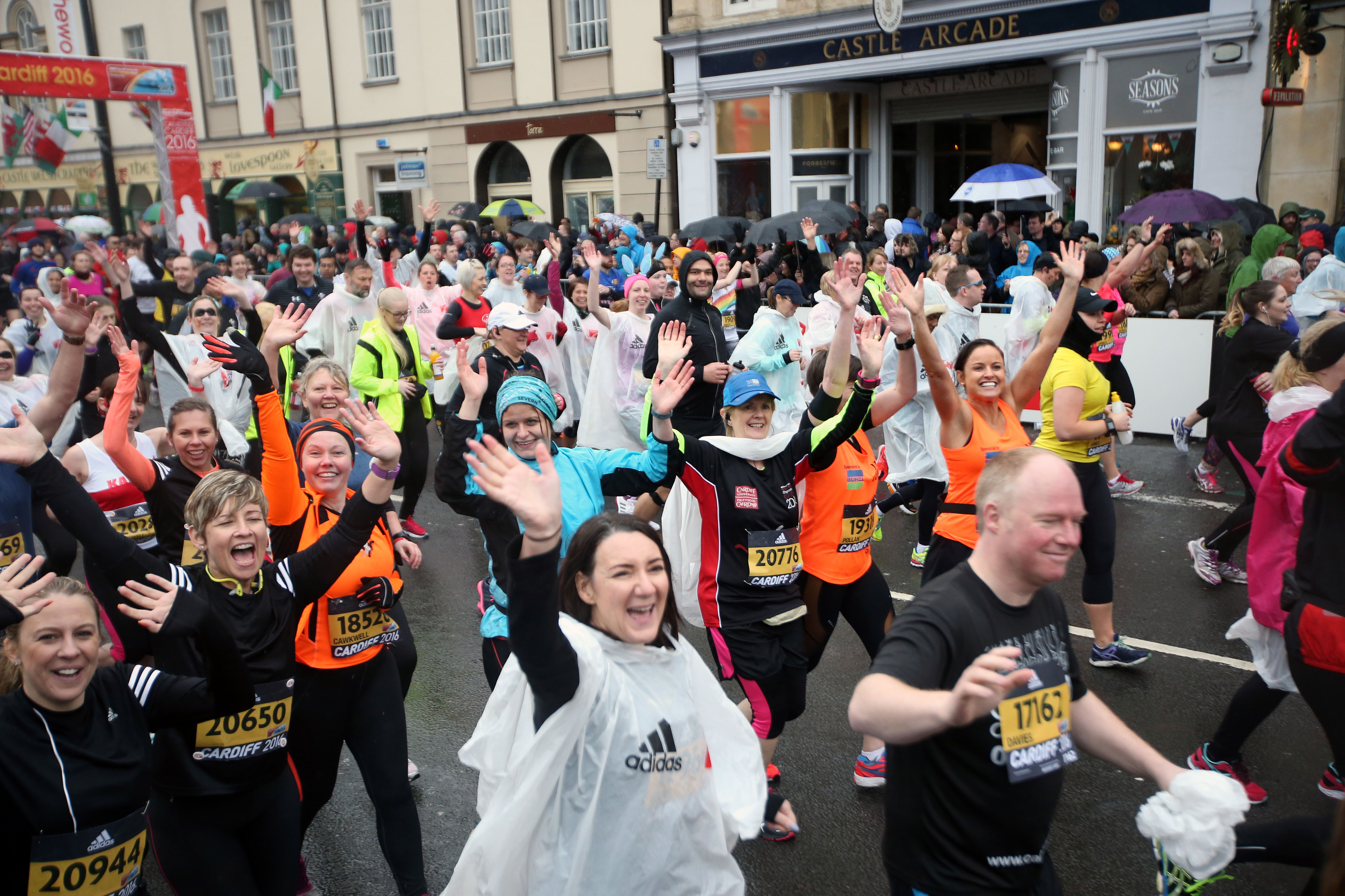 Cardiff Half Marathon runners waving