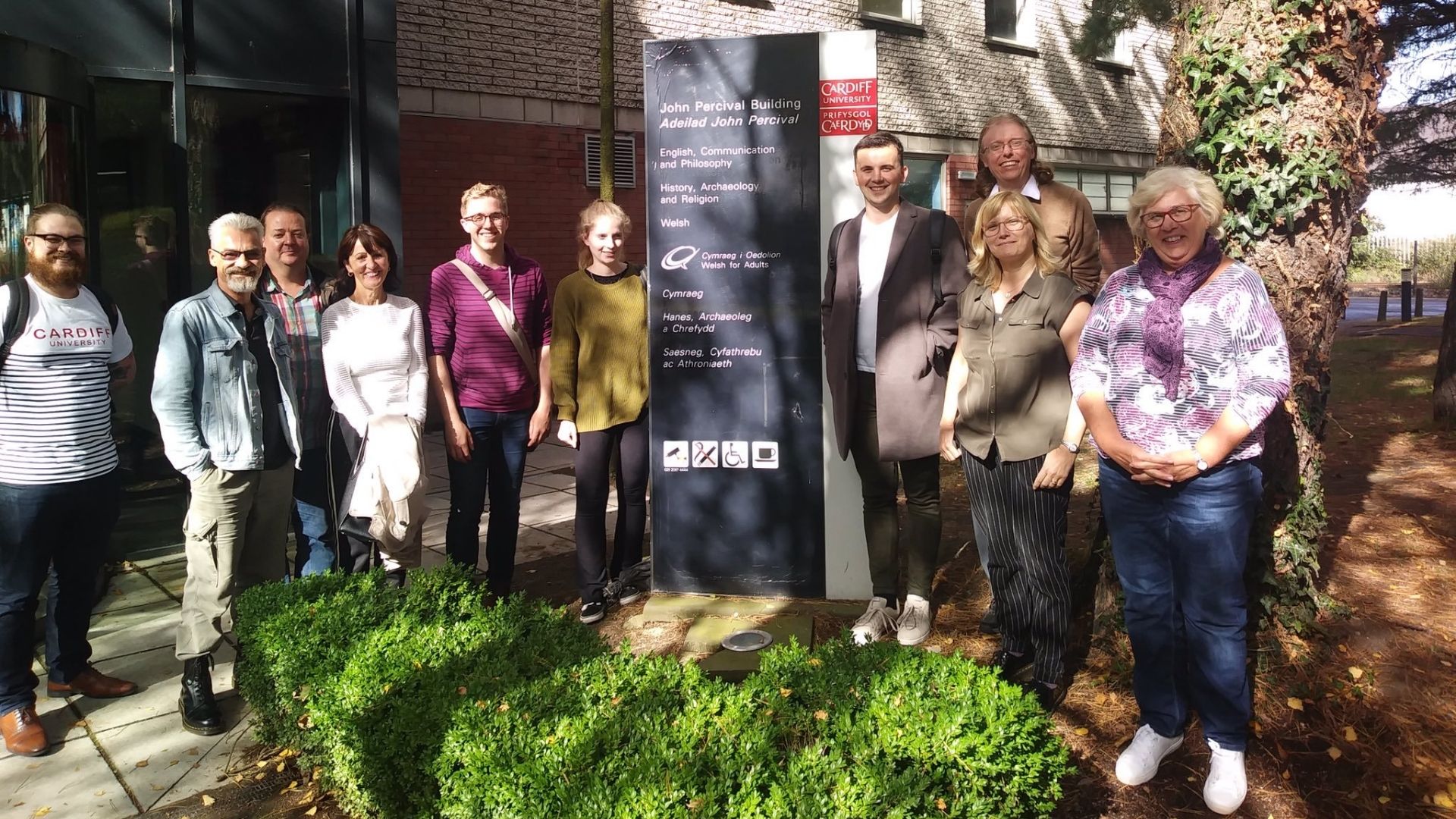 Group of adult learners outside John Percival Building