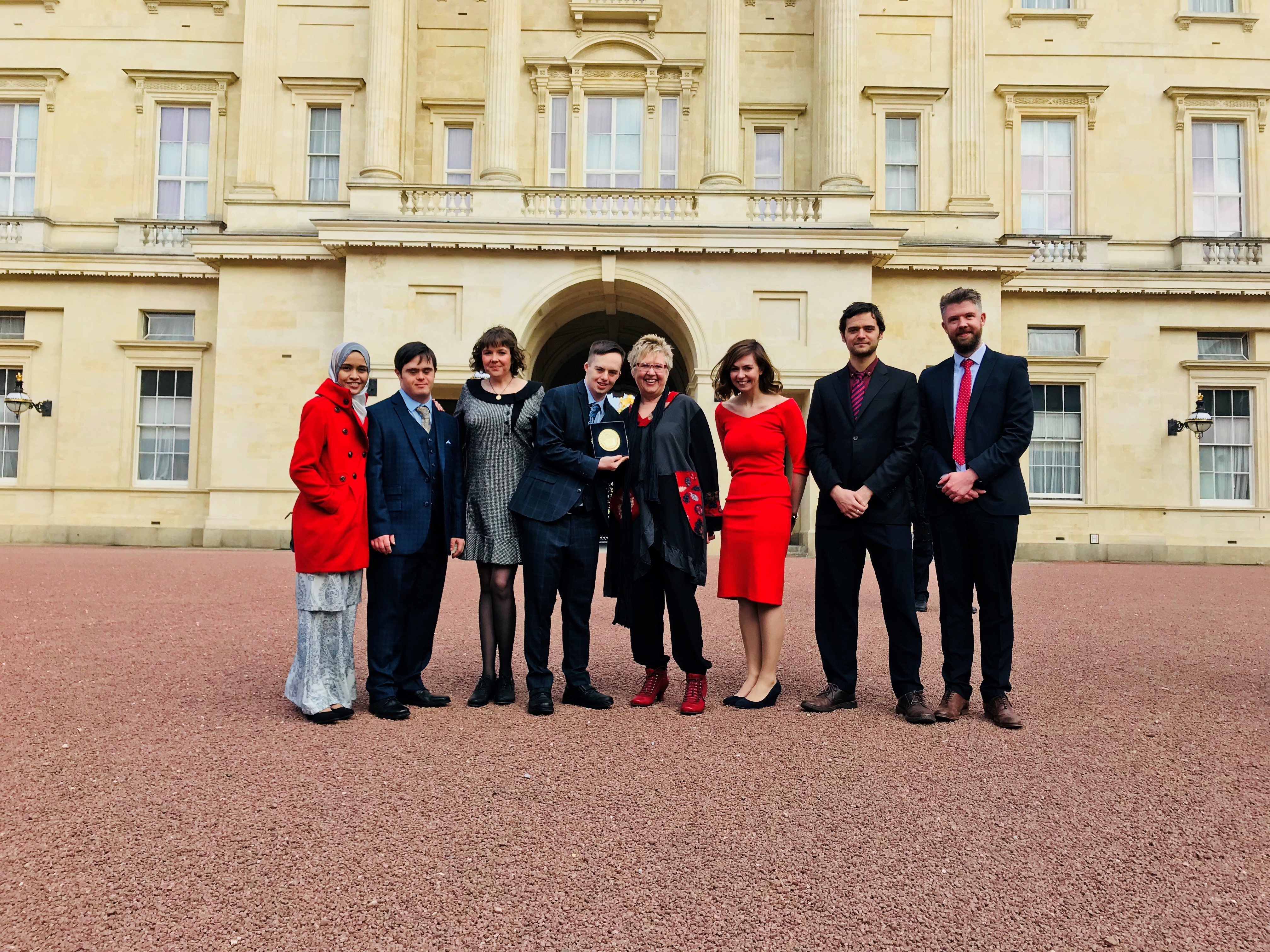 Image of Dr Maggie Woodhouse outside Buckingham Palace