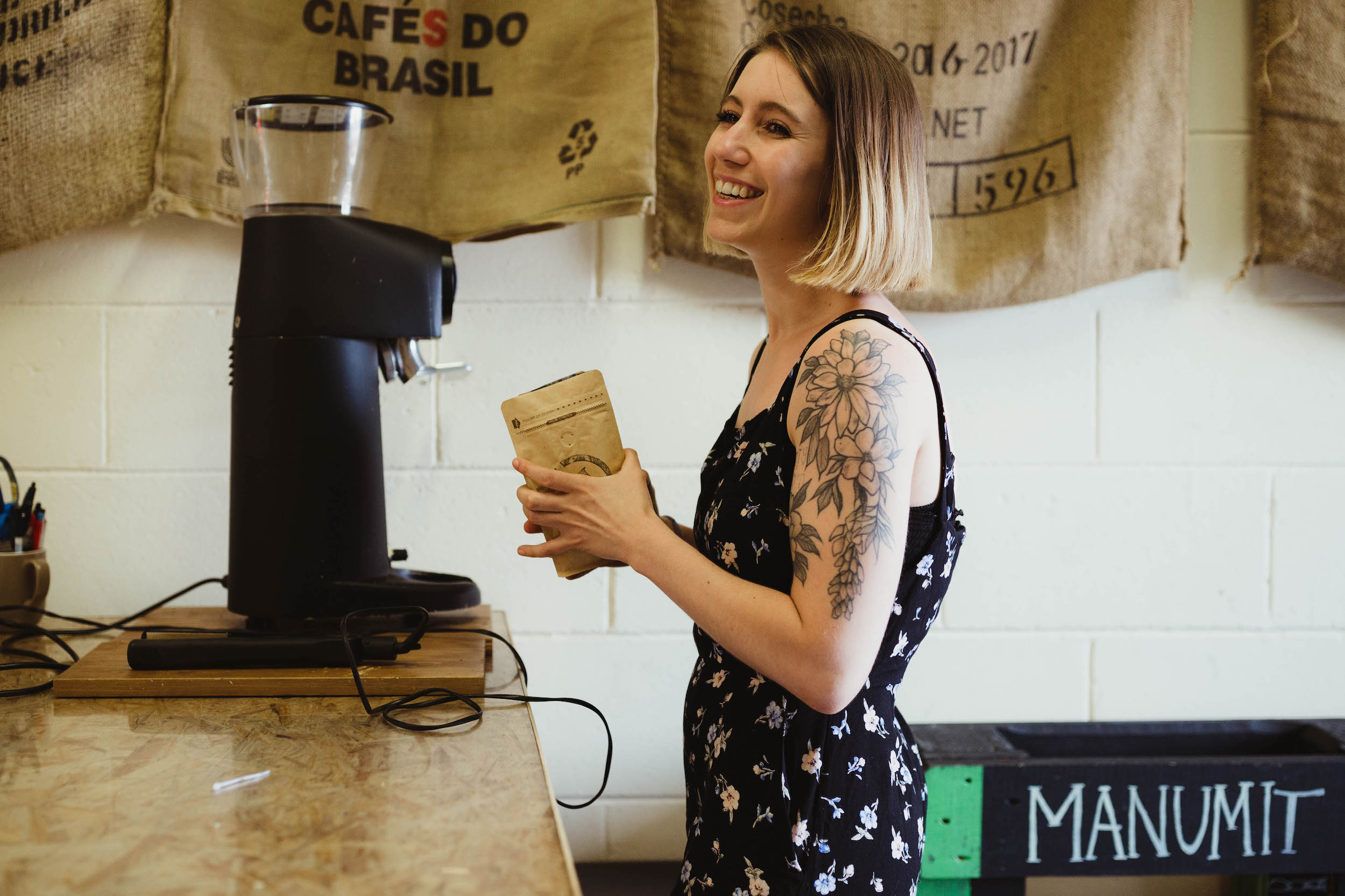 Woman making a coffee